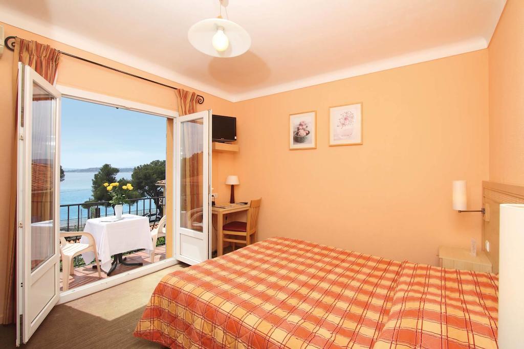 Logis Hotel Le Provencal Les Issambres Kamer foto
